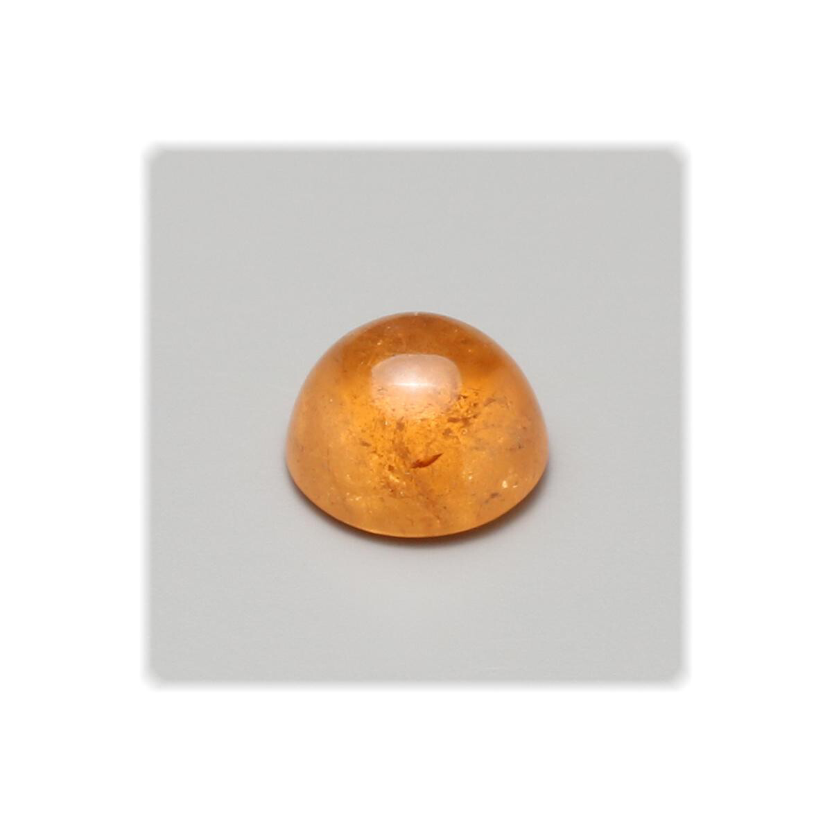 Mandarin Granat / Cabochon / rund 6,2 mm / 1,57 ct. / Afrika